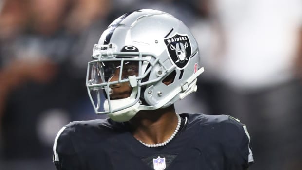 Former Raiders wide receiver Henry Ruggs III takes the field during a game in 2021.